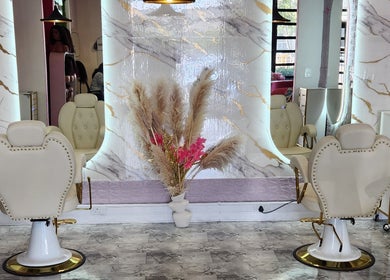 Elegant salon interior with chic chairs at Ginasty Nails&Beauty Studio, Cape Town, Western Cape, ZA.