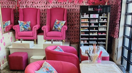 Vibrant nail salon seating at Ginasty Nails&Beauty Studio, Cape Town, Western Cape, ZA with pink decor.