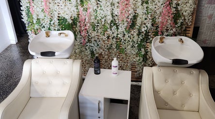 Luxurious wash stations at Ginasty Nails & Beauty Studio, Cape Town, Western Cape, ZA, adorned with floral decor.
