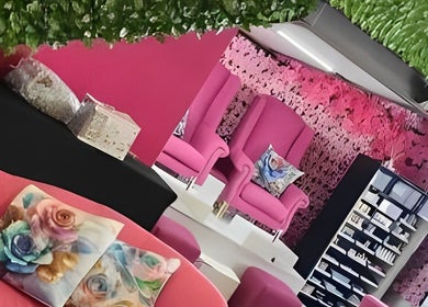Elegant seating area at Ginasty Nails&Beauty Studio, Cape Town, Western Cape, ZA, featuring vibrant pink decor.