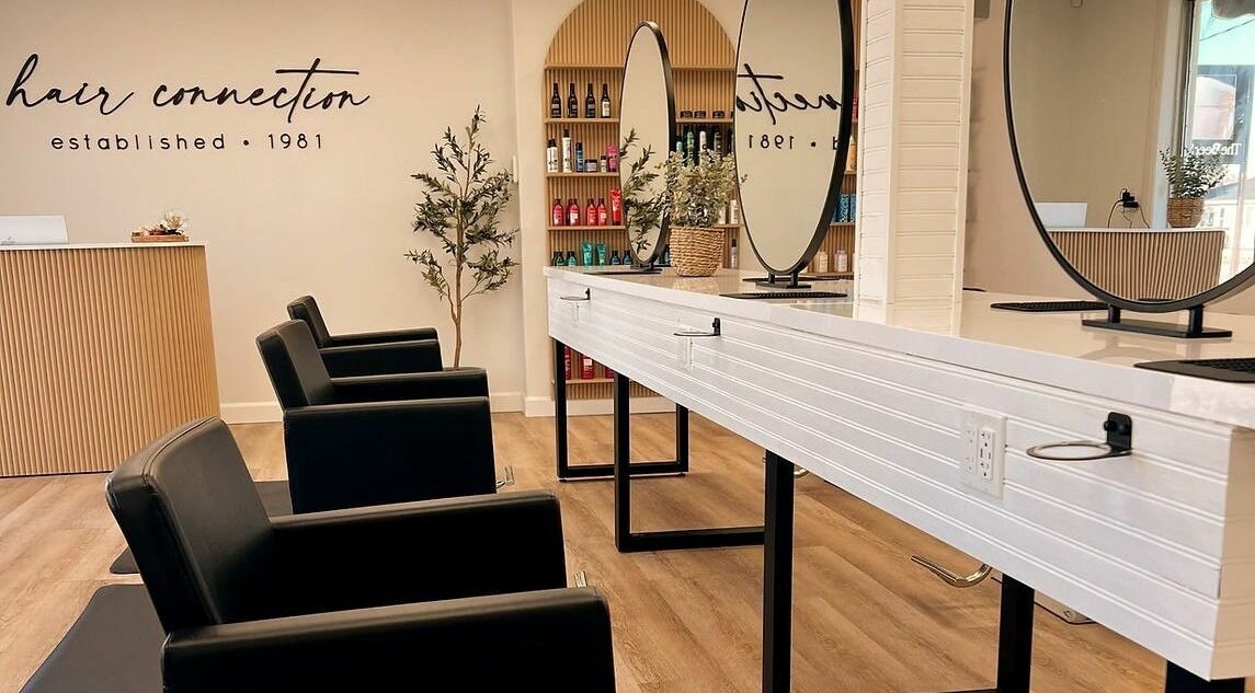 Elegant interior of Hair Connection Port Elgin in Port Elgin, Ontario, CA, featuring modern salon chairs and mirrors.
