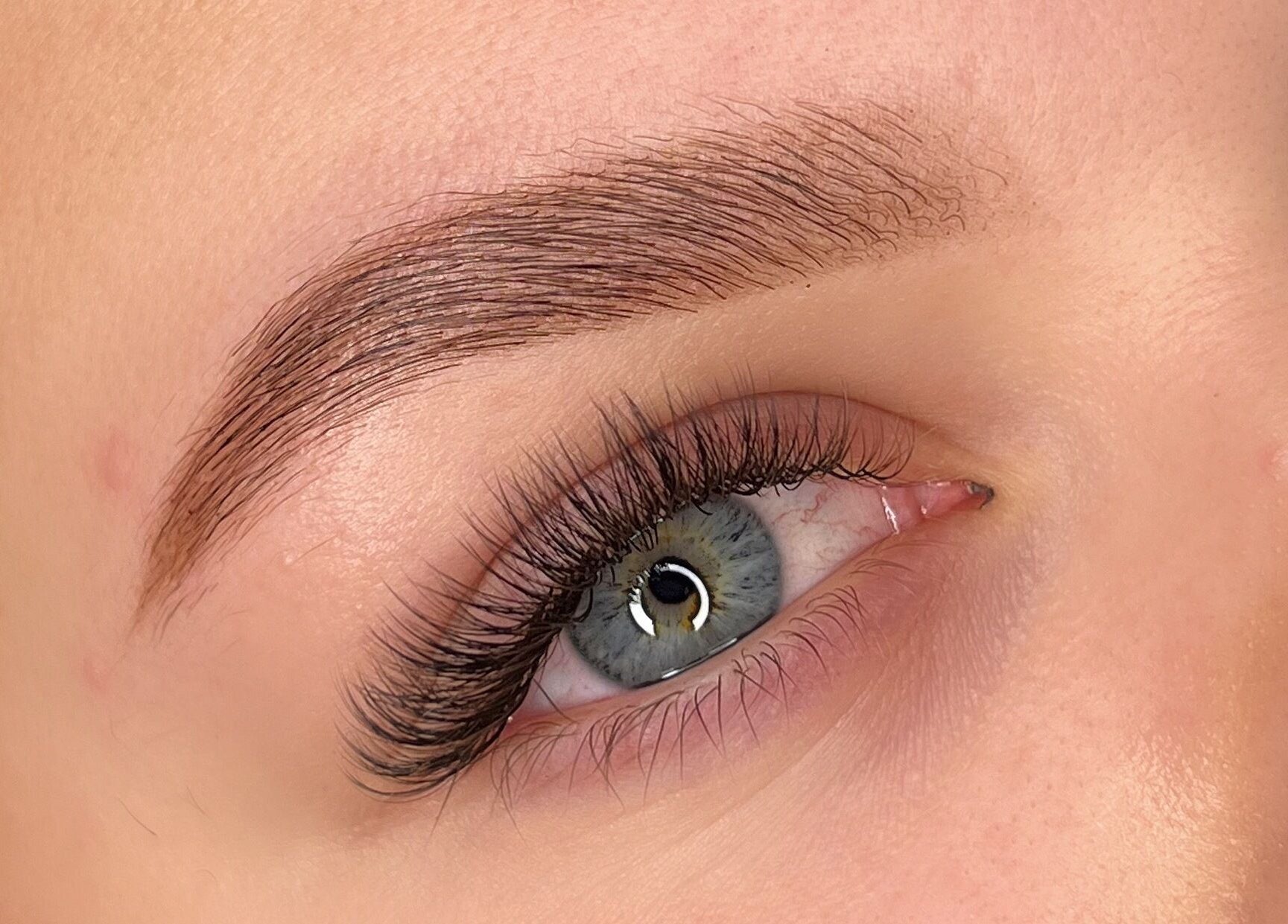 Close-up of eyelash extensions by By Bethany Rose in Hatfield, England, GB highlighting full lashes.