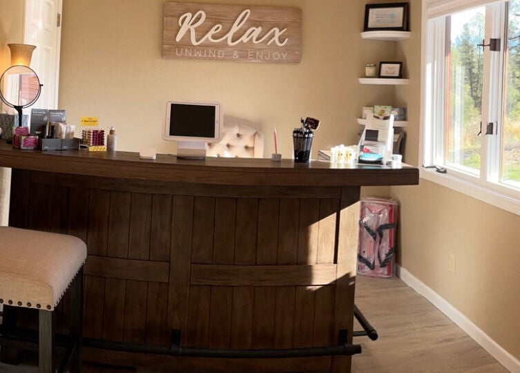 Welcoming reception area at Natural Reflections Spa, Elizabeth, Colorado, US. Inviting and peaceful environment.