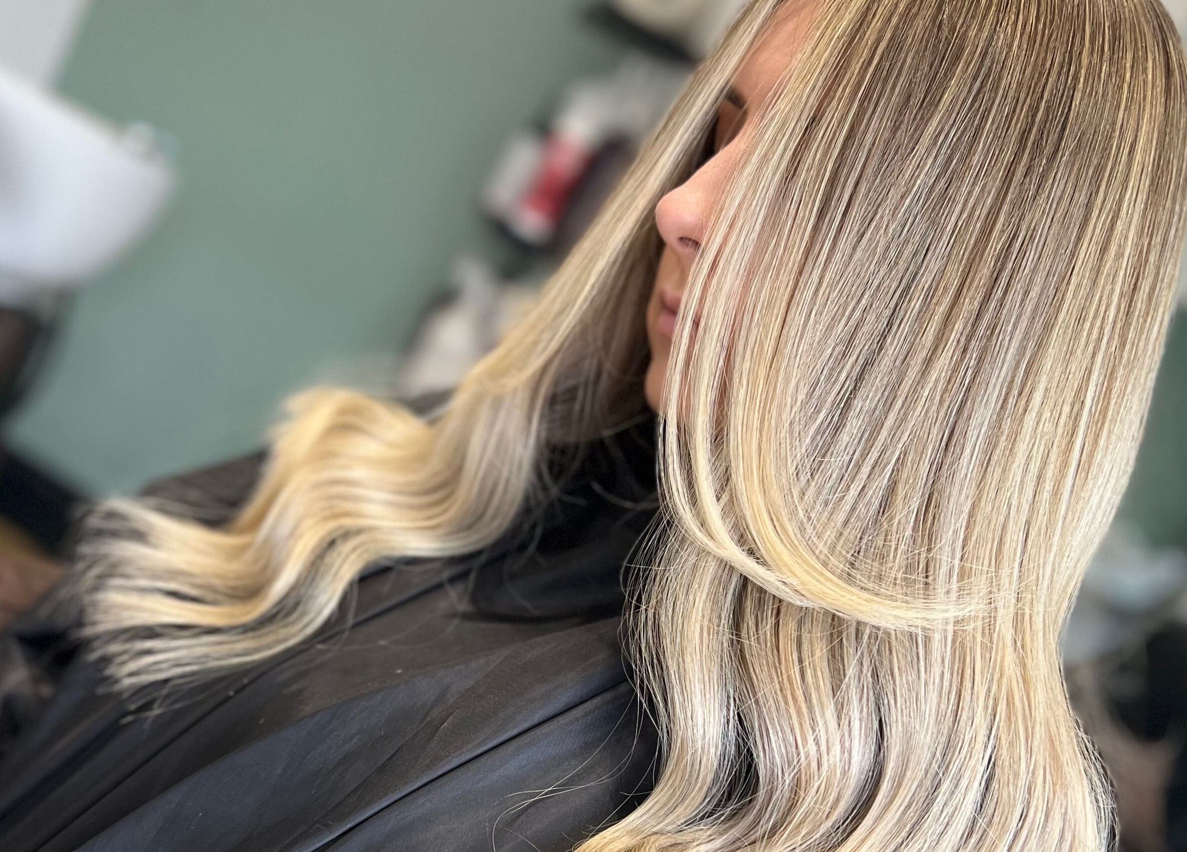 Elegant blonde highlights at Danielle Farlow Hairdressing, Bolton, England, GB, showcasing expert styling.