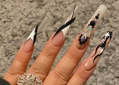 Exquisite long nail art design showcasing intricate details at MiLinda519, Savannah, Georgia, US.