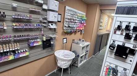 Cassidy's Beauty Salon in Poole, England, GB displays vibrant nail and beauty products on stylish shelves.