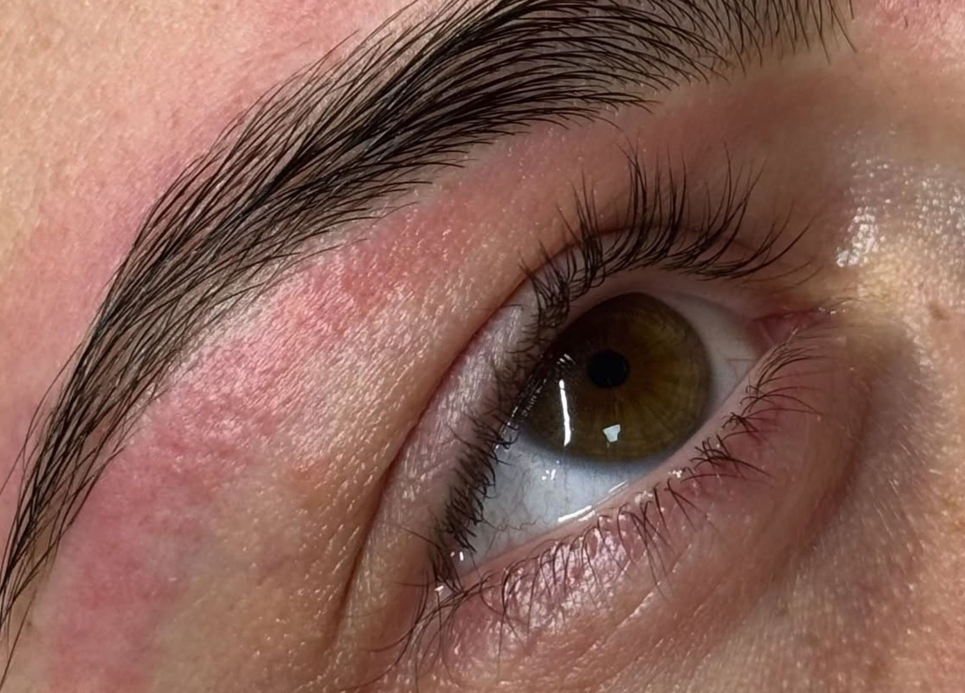 Perfectly shaped eyebrows from microblading at Cassidy's Beauty Salon in Poole, England, GB.