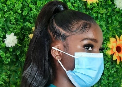 Stylish hair at Niva Creations, Saint Michael, BB, with floral backdrop, showcasing modern wellness services.
