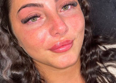 Close-up of woman's enhanced eyelashes at Lashes by BW, Atherstone, England, GB showcasing lush extensions.