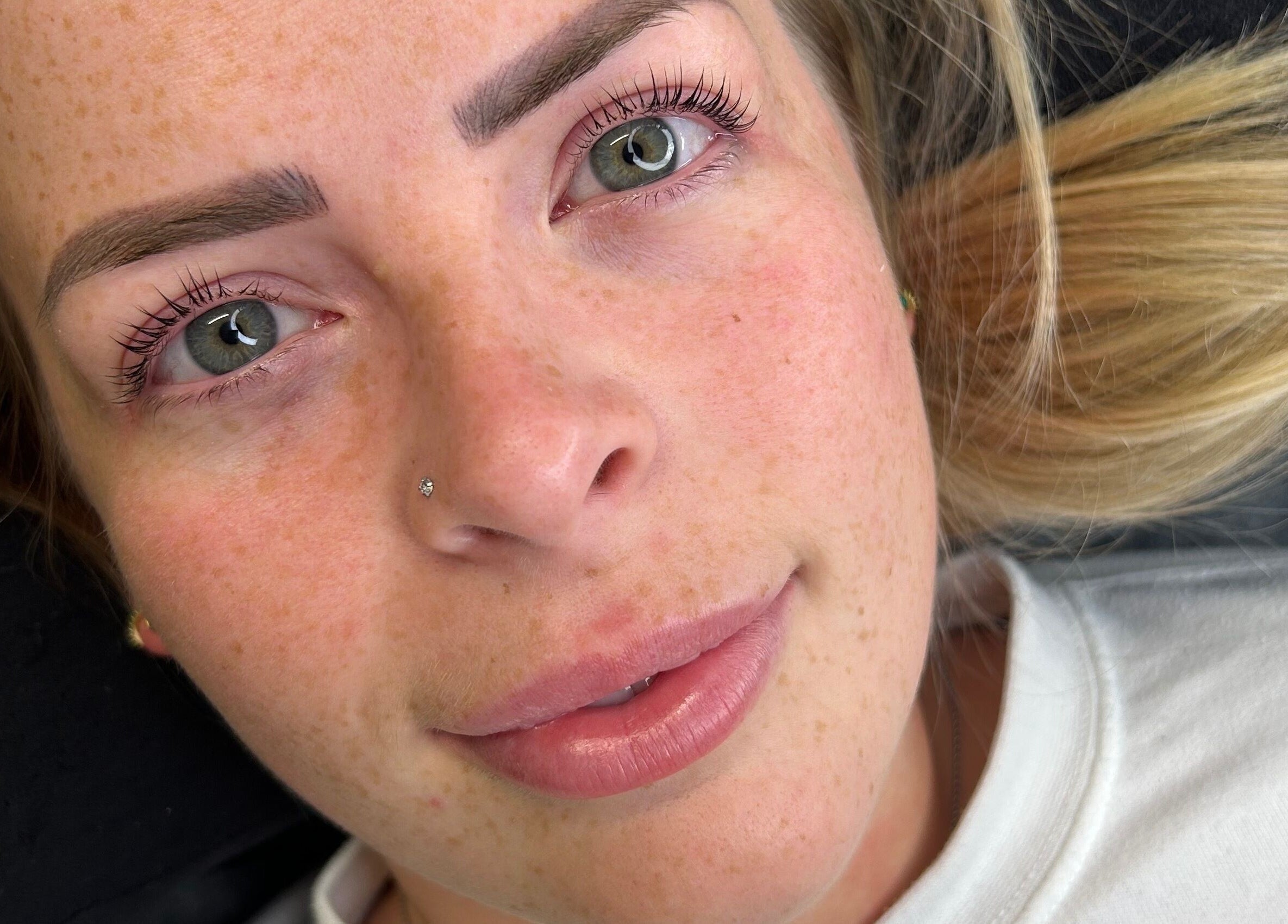 Woman showcasing enhanced lashes at Lashes by BW, Atherstone, England, GB.