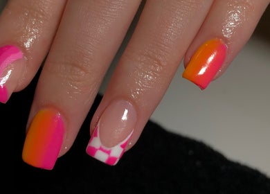 Bright neon and checkered nail art at A K Beauty @ The Salon, Kempston, England, GB offers trendy styles.