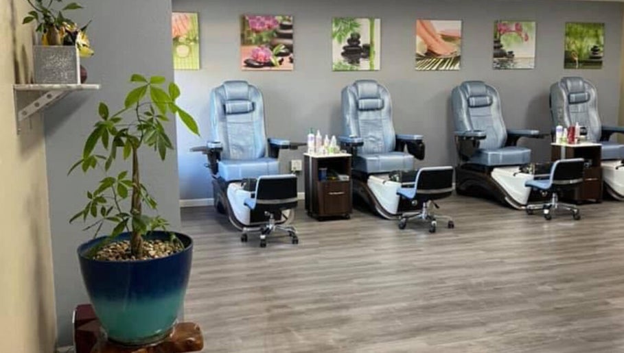 Comfortable pedicure chairs line the serene T-nails spa woodburn in Woodburn, Oregon, US.