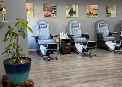 Comfortable pedicure chairs line the serene T-nails spa woodburn in Woodburn, Oregon, US.