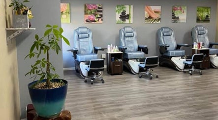 Comfortable pedicure chairs line the serene T-nails spa woodburn in Woodburn, Oregon, US.