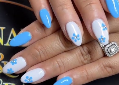 Stunning blue and white flower nail art at T-nails spa woodburn, Woodburn, Oregon, US.