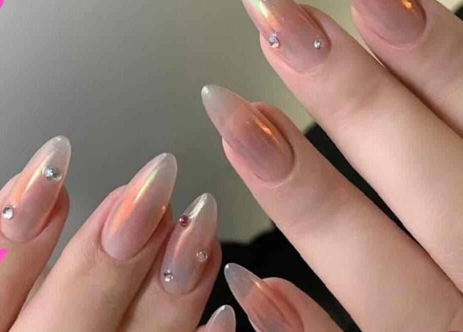 Elegant nail art with gems at T-nails Spa Woodburn, Woodburn, Oregon, US, showcasing glossy finish.