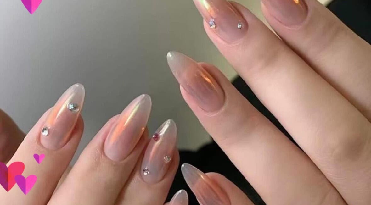 Elegant nail art with gems at T-nails Spa Woodburn, Woodburn, Oregon, US, showcasing glossy finish.