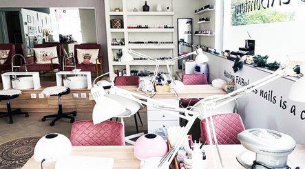 Elegant nail care setup at Fabulous Laboratory, Athina, Attici, GR with plush chairs and manicure tables.