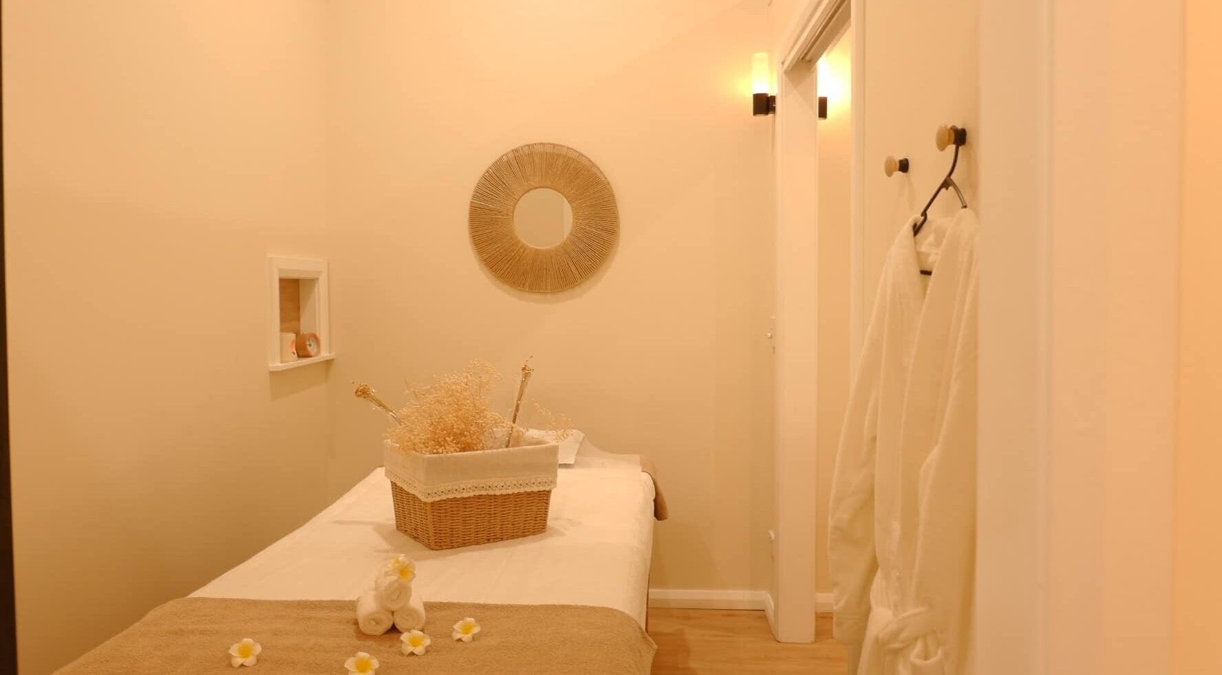 Tranquil room at Home thai therapeutic massage Wollongong, New South Wales, AU featuring a calming massage table.