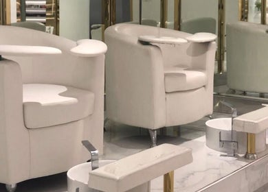 Modern pedicure chairs at Lillia Beauty Lounge, Manama, Muḥāfaẓat al-ʿĀṣimah, BH, embodying luxury and comfort.