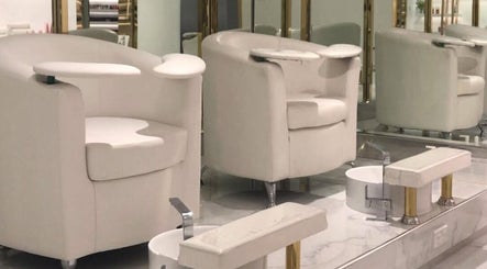 Modern pedicure chairs at Lillia Beauty Lounge, Manama, Muḥāfaẓat al-ʿĀṣimah, BH, embodying luxury and comfort.