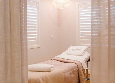 Tranquil spa room at Ministry of Skin, Torquay, Victoria, AU featuring a comfortable treatment bed.