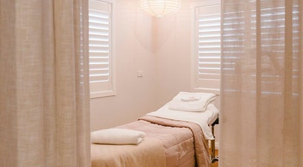 Tranquil spa room at Ministry of Skin, Torquay, Victoria, AU featuring a comfortable treatment bed.