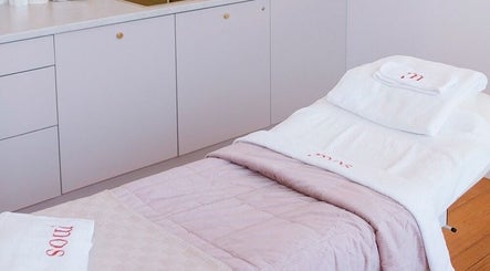 Elegantly prepared treatment room at Ministry of Skin, Torquay, Victoria, AU, highlighting relaxation and comfort.