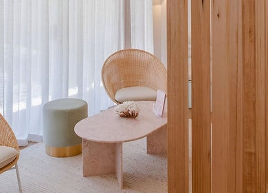 Tranquil waiting area at Ministry of Skin, Torquay, Victoria, AU with cozy chairs and soft lighting.