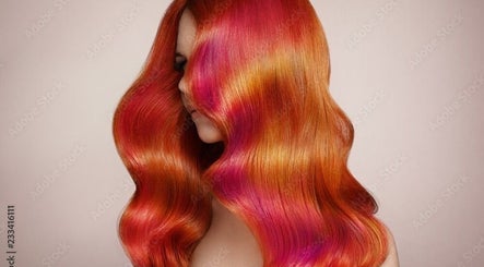 Woman with vibrant red and orange hair waves at Bedford Sunnyside mall, Bedford, Nova Scotia, CA.