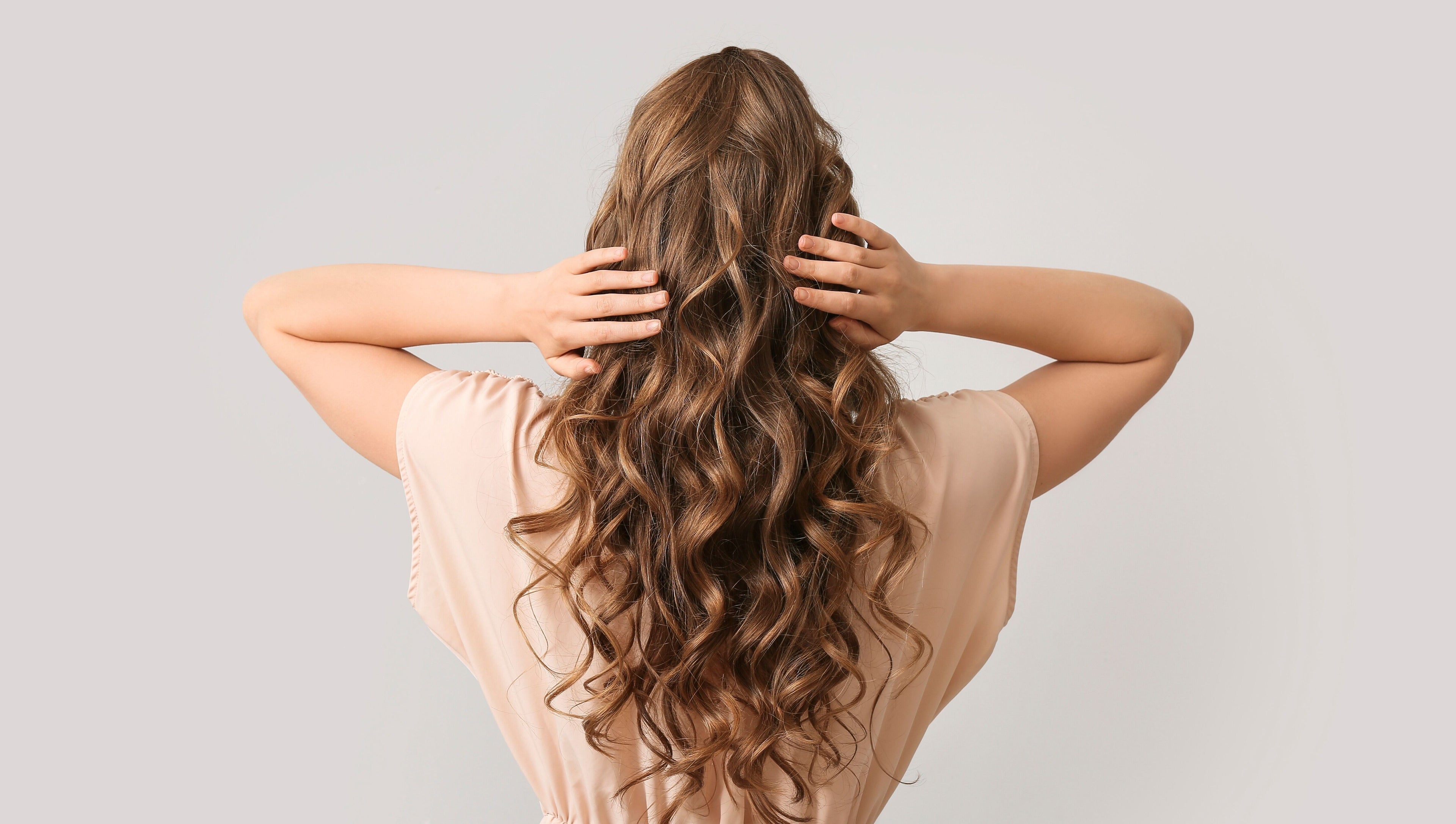 Luxurious wavy hairstyle at Bedford Sunnyside Mall, Bedford, Nova Scotia, CA, perfect for special occasions.