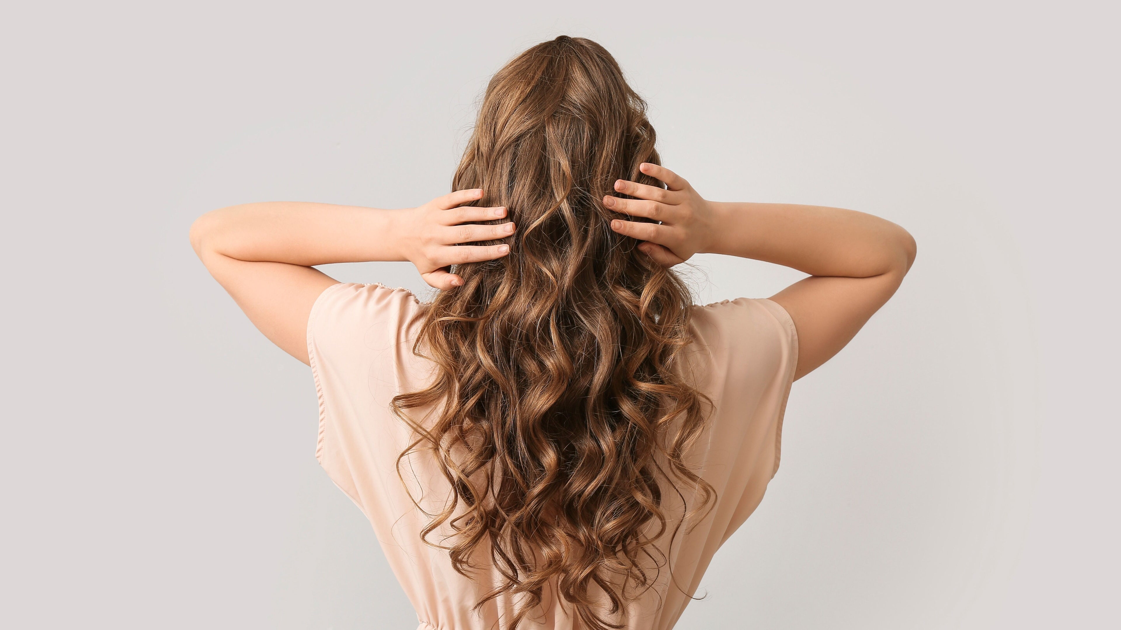 Luxurious wavy hairstyle at Bedford Sunnyside Mall, Bedford, Nova Scotia, CA, perfect for special occasions.