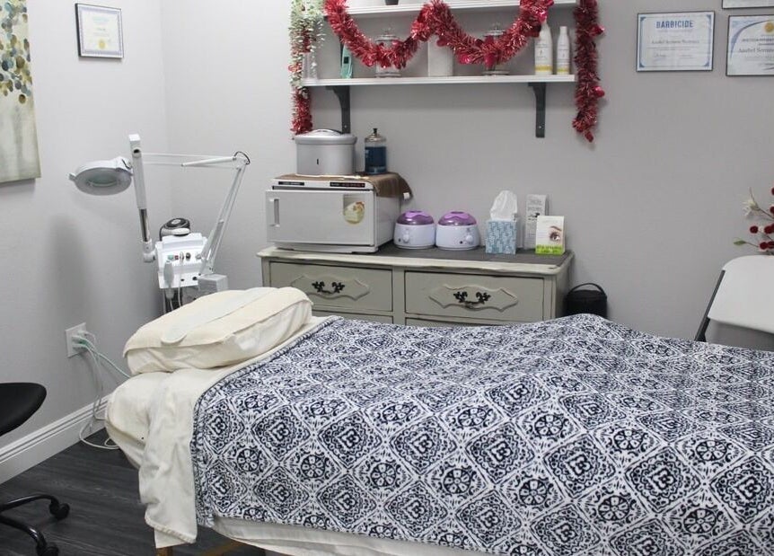 Relaxing treatment room at Tanz Spa in Deltona, Florida, US complete with bed and skincare equipment.