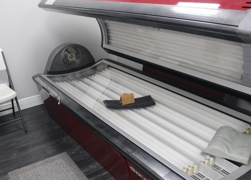 Tanning bed at Tanz Spa in Deltona, Florida, US offers relaxing sun-kissed glow in a modern setting.