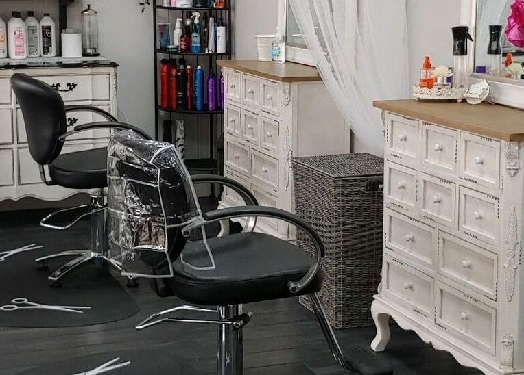 Elegant salon interior at Tanz Spa, featuring stylish chairs and decor in Deltona, Florida, US.