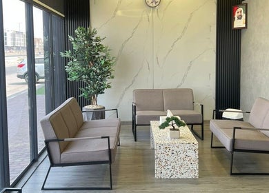 Spacious waiting area at Retro Grooming Lounge for Men in Umm Al Quwain, AE with modern seating and decor.