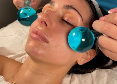 Facial treatment at Emily Nagle Skin, Wallasey, England, GB using blue spheres for rejuvenation.