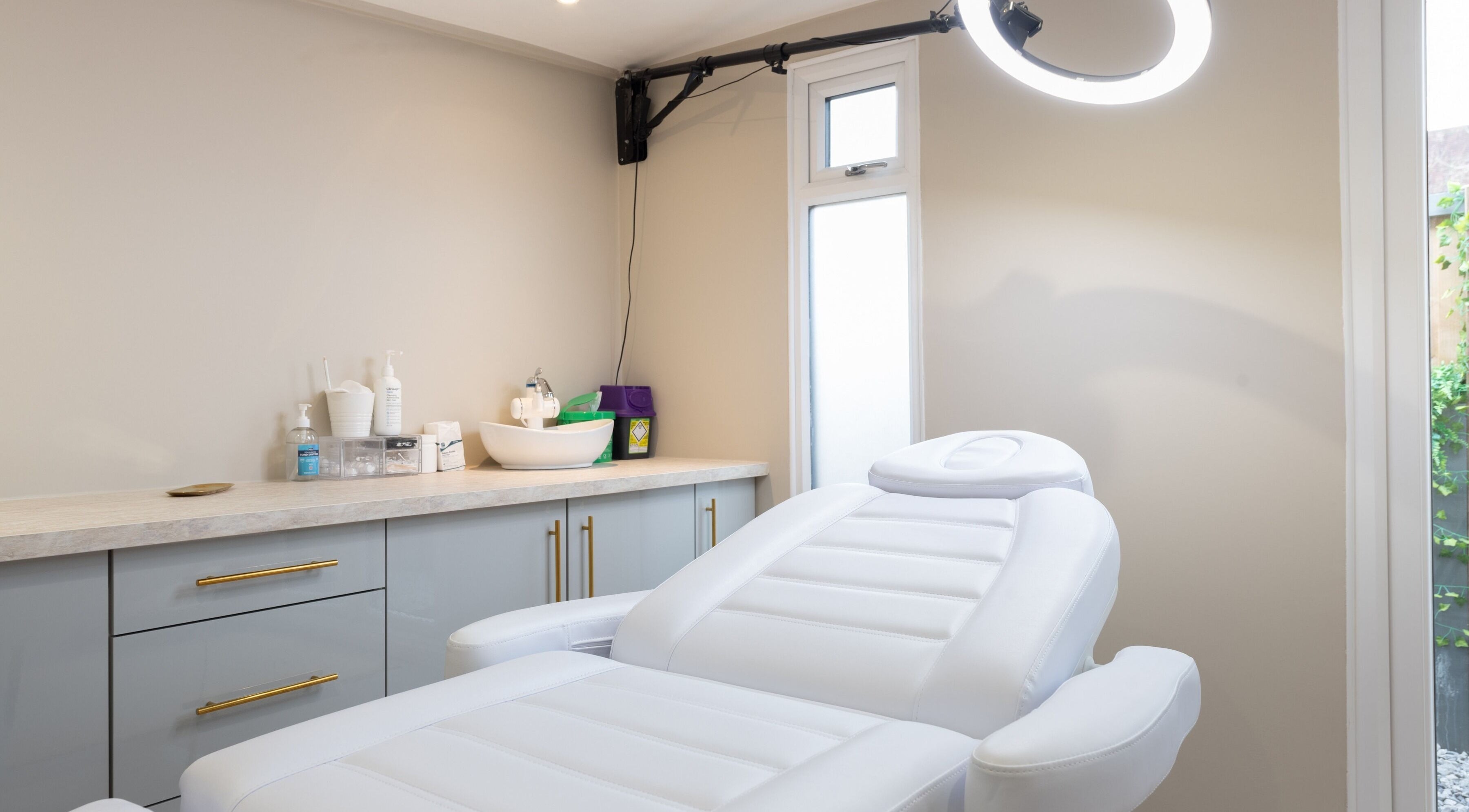 Elegant treatment room at The Aesthetics Bae Clinic - Winchester, offering wellness services in Winchester, England, GB.