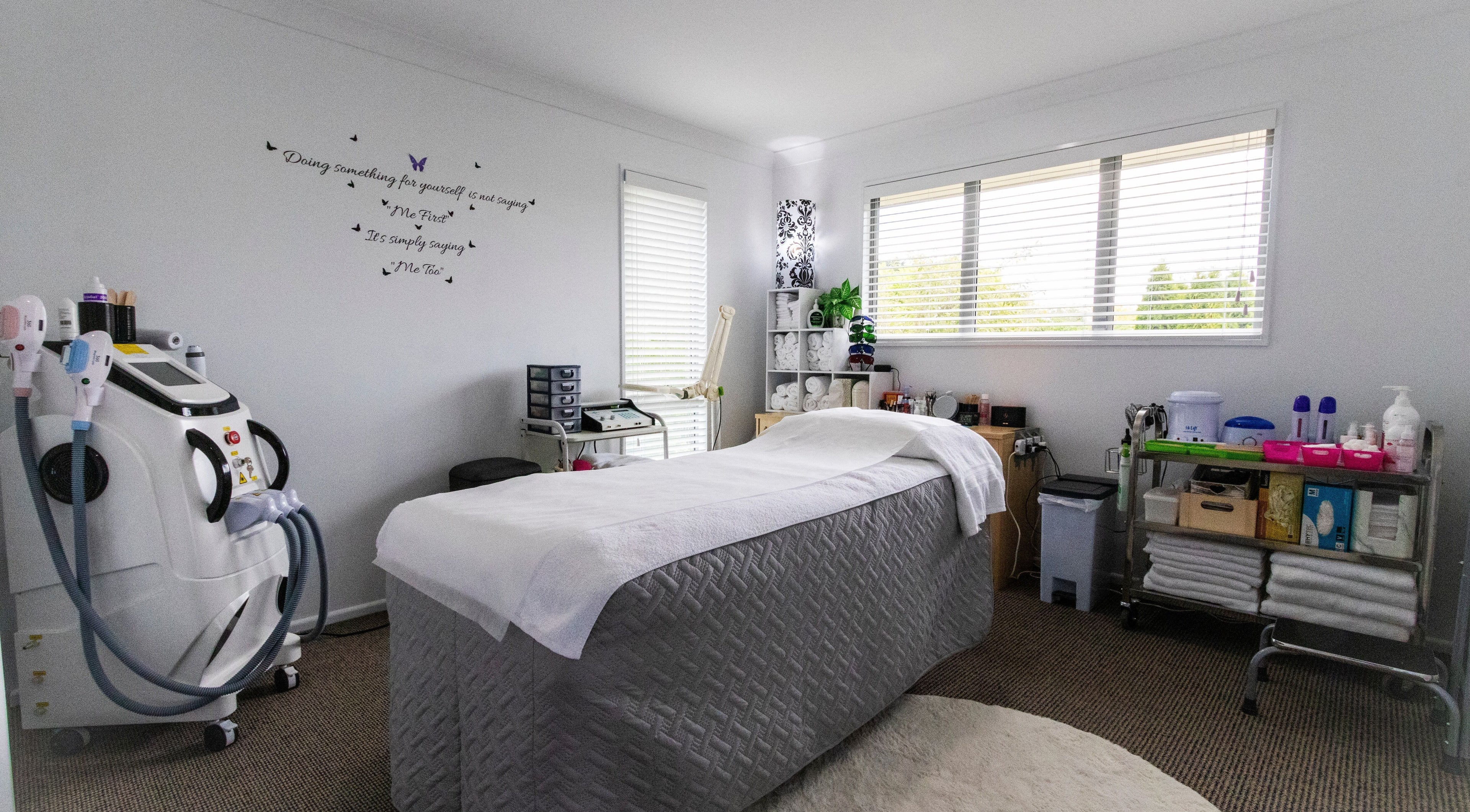 Cozy treatment room at Beauty and Elegance, Christchurch, Canterbury, NZ, featuring a massage bed and equipment.
