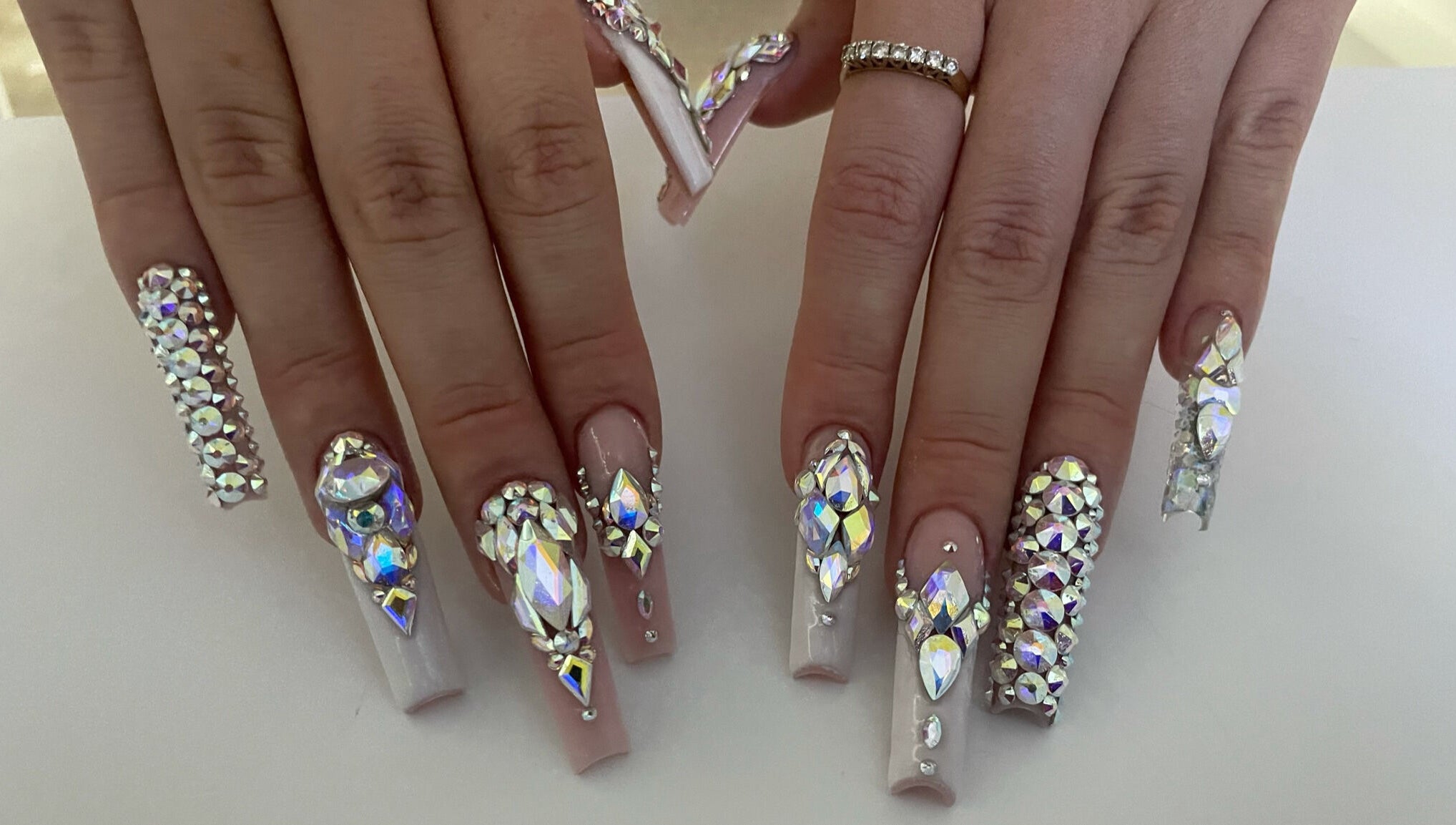 Glamorous crystal-encrusted nails at Classy Claws in Vancouver, British Columbia, CA.