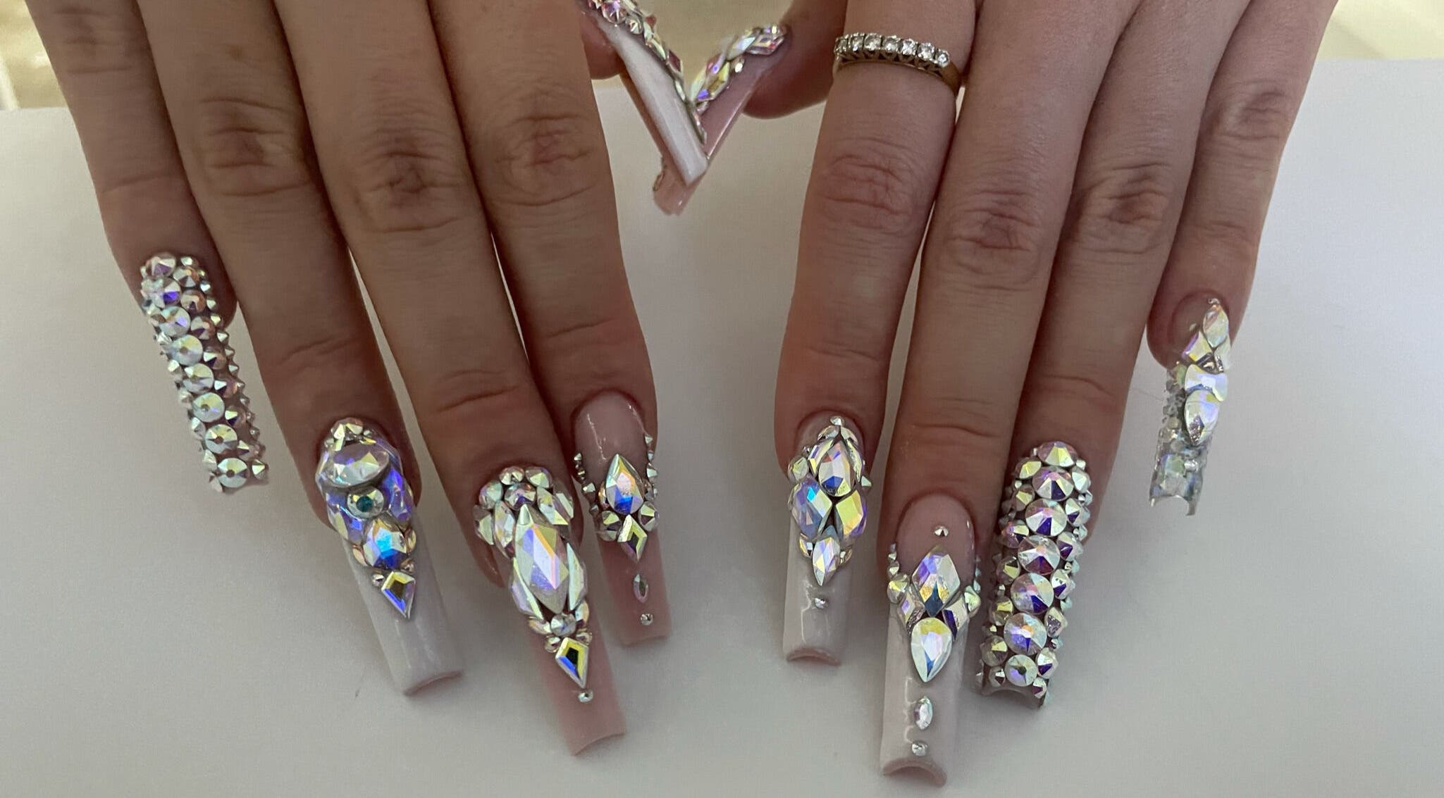 Glamorous crystal-encrusted nails at Classy Claws in Vancouver, British Columbia, CA.