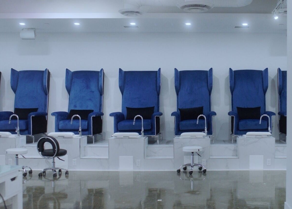 Luxurious blue pedicure chairs at Classy Claws, Vancouver, British Columbia, CA, for ultimate relaxation.