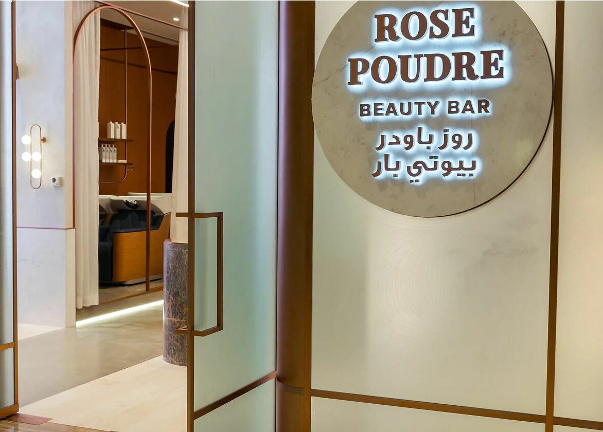 Entrance to Rose Poudre Beauty Bar, Abu Dhabi, AE featuring elegant interior design.