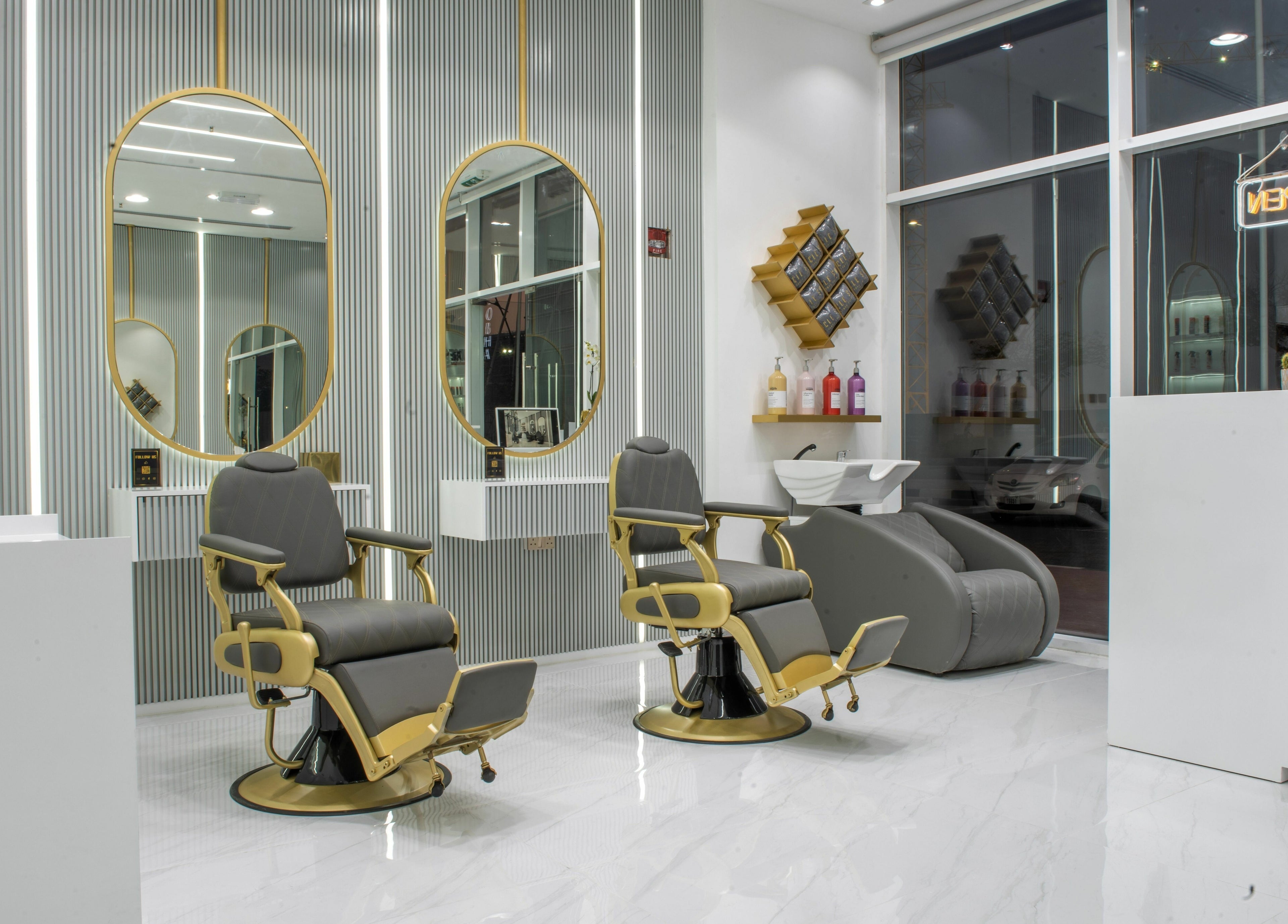 Elegant interior of Uncle SAM Gents Salon in Dubaï, Dubaï, AE, showcasing luxury barber chairs and modern decor.
