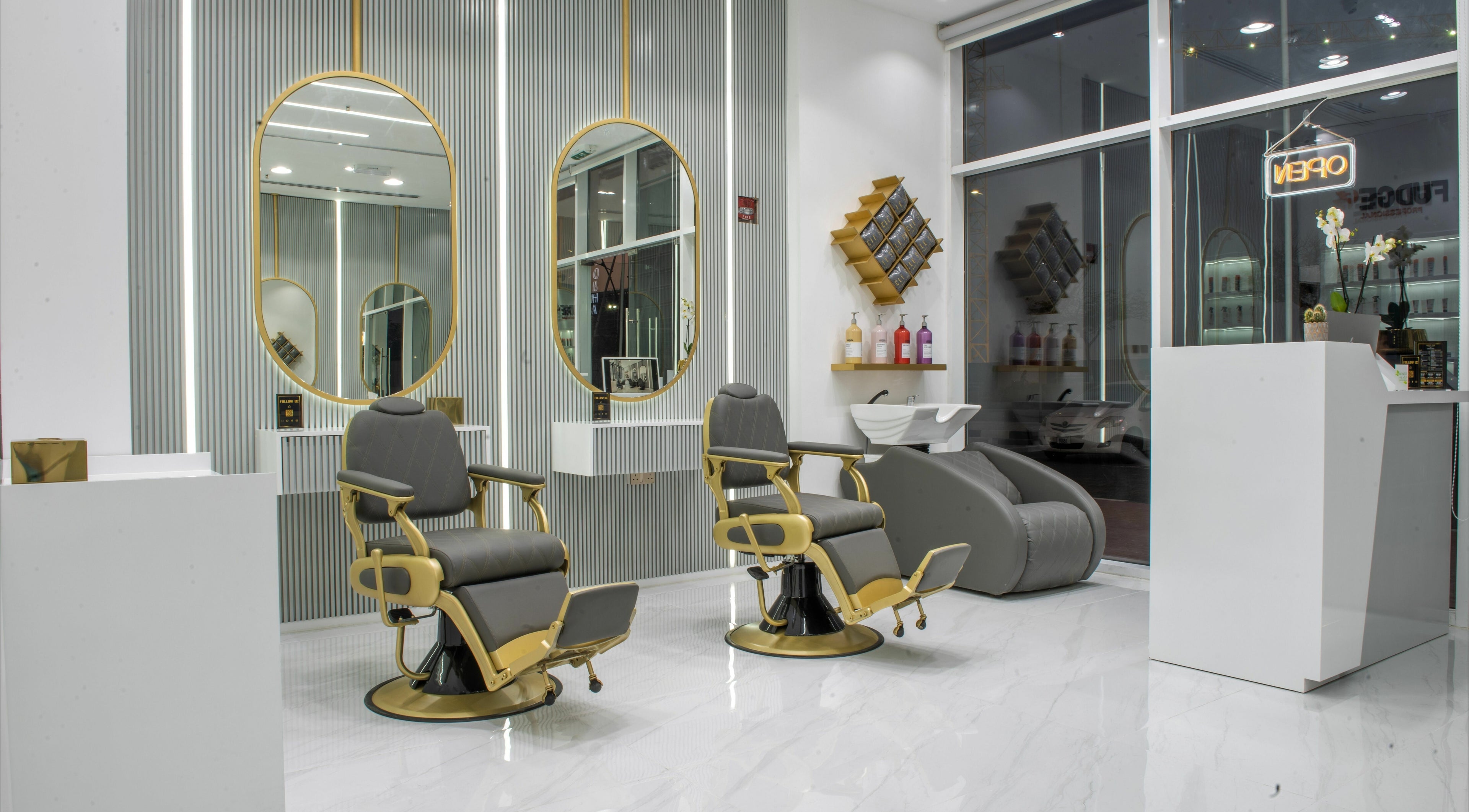 Elegant interior of Uncle SAM Gents Salon in Dubaï, Dubaï, AE, showcasing luxury barber chairs and modern decor.