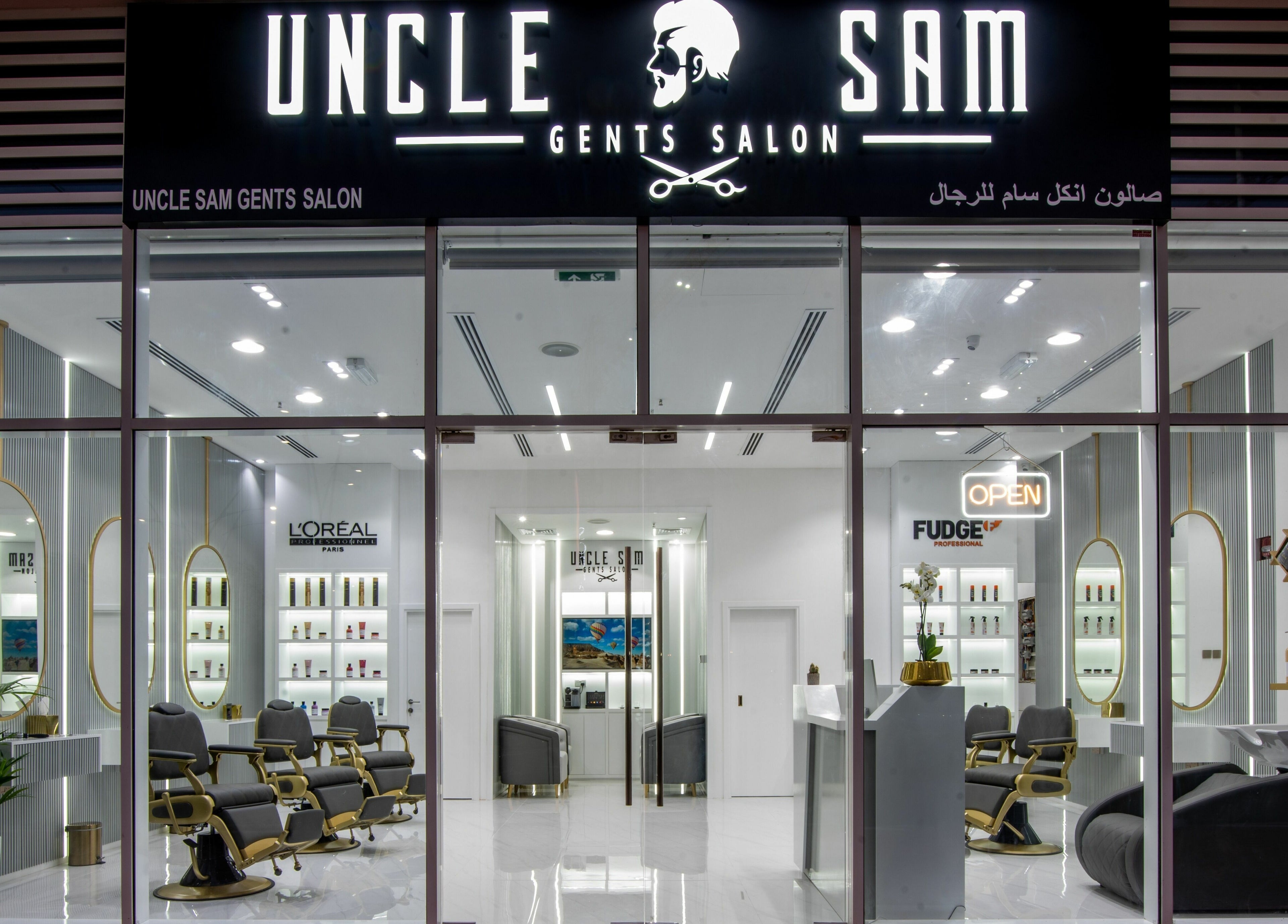 Front view of Uncle SAM Gents Salon in Dubaï, showcasing its sleek interior design and modern amenities.