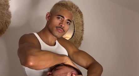 Therapist at Leme Personal Therapy - MALE Massage & Spa in London, England, GB performing a neck massage.