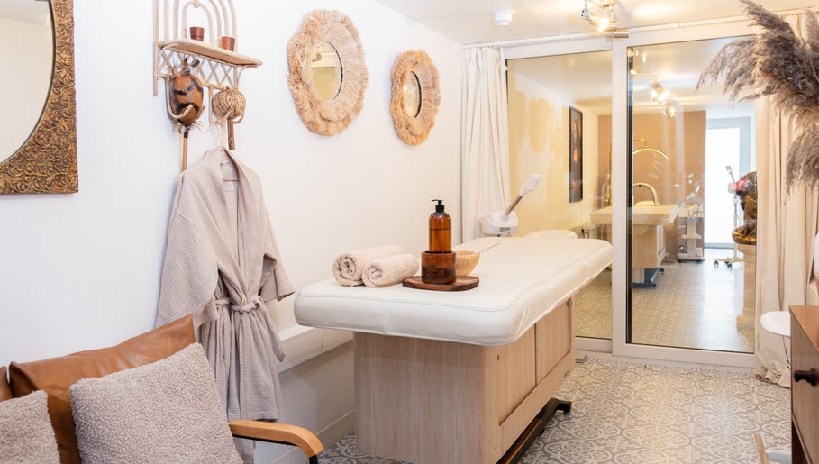 Cozy massage room at Studio Leme - Male Massage & Spa, London, England, GB features elegant decor and massage table.