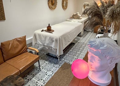 Tranquil massage room at Studio Leme - Male Massage & Spa in London, England, GB, featuring elegant decor.
