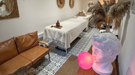 Tranquil massage room at Studio Leme - Male Massage & Spa in London, England, GB, featuring elegant decor.